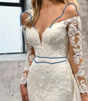 Изготовленное на заказ свадебное платье 